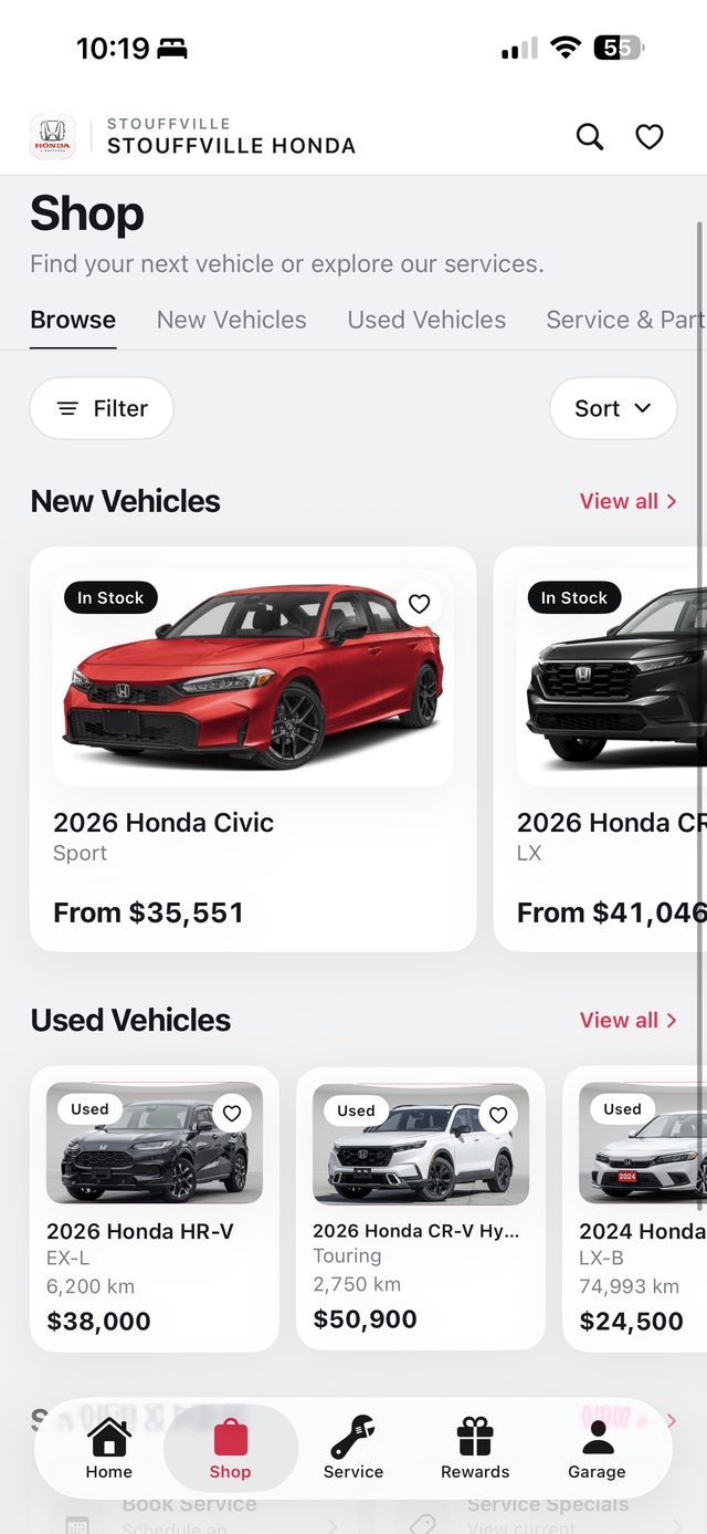 Shop screen: new and used vehicle inventory with prices